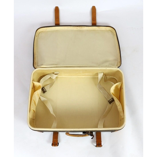 45 - A 1980/90s Louis Vuitton canvas monogram suitcase, with calf leather straps and brass hardware, inte... 