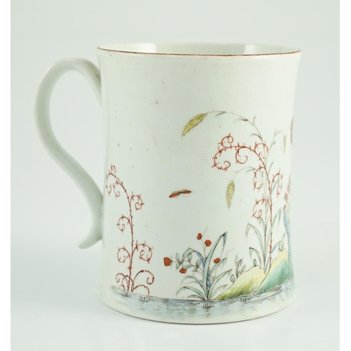 100 - A rare Worcester polychrome 'flower and rockwork' small mug, c.1753-54, painted with rockwork, scrol... 