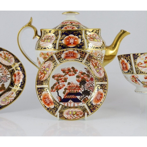 102 - A Spode part tea service painted in Imari style with pattern 1956, c.1820, comprising a teapot cover... 