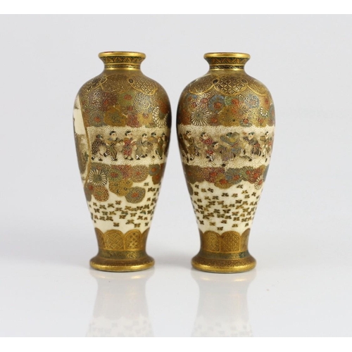 107 - A pair of Japanese Satsuma pottery vases, signed Hankizan, Meiji period, each finely painted with an... 