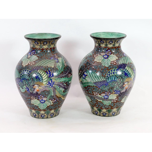 109 - A pair of massive Japanese Kutani porcelain vases, Meiji period, influenced by de Morgan designs, ea... 