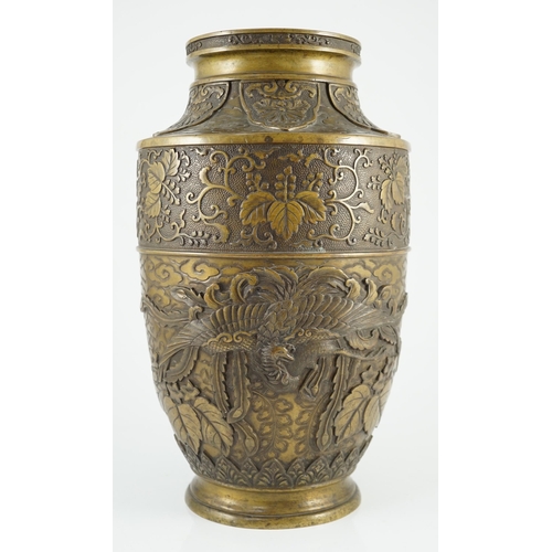 115 - A Japanese bronze vase, Meiji period, cast in relief with phoenixes amid flowers, foliage and clouds... 