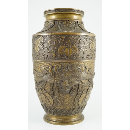 115 - A Japanese bronze vase, Meiji period, cast in relief with phoenixes amid flowers, foliage and clouds... 