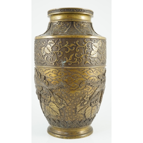 115 - A Japanese bronze vase, Meiji period, cast in relief with phoenixes amid flowers, foliage and clouds... 