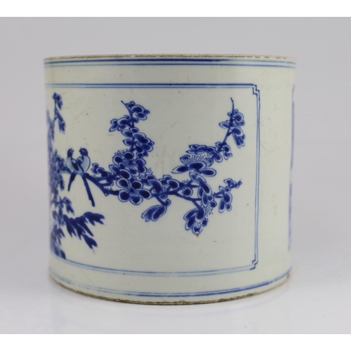 121 - A Chinese blue and white landscape brushpot, bitong, Kangxi period, painted to rectangular reserve... 