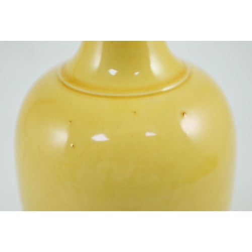 134 - A Chinese yellow glazed bottle vase, Kangxi mark possibly Republic period, 24.2cm high