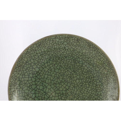 140 - A large Chinese Guan type crackle glaze dish, 19th/20th century, 45.5cm diameter