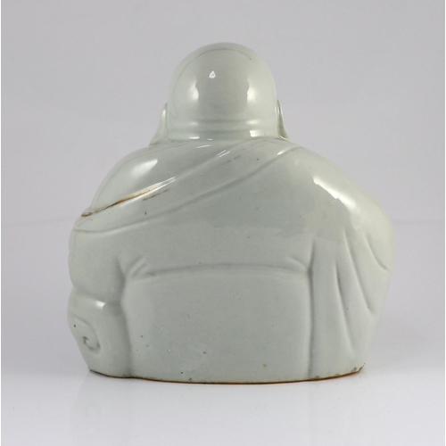 147 - A Chinese porcelain figure of Budai, Republic period, holding a rosary in his right hand, his robe i... 