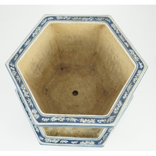 156 - A Chinese hexagonal blue and white planter and underdish, 19th century, painted with alternating pan... 