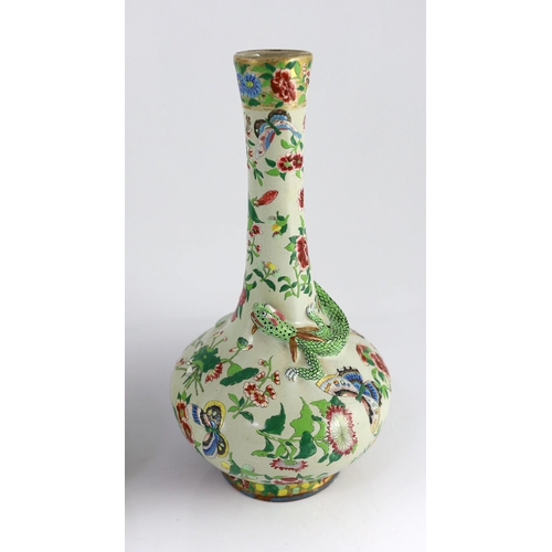 166 - A pair of Chinese enamelled porcelain crackle glaze bottle vases, mid 19th century, each painted wit... 