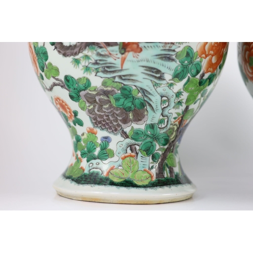 167 - A pair of large Chinese famille verte jars and covers, late 19th century, each painted with pheasant... 