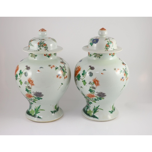 167 - A pair of large Chinese famille verte jars and covers, late 19th century, each painted with pheasant... 