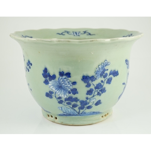 169 - A Chinese blue and white celadon ground flower pot, late 19th century, moulded in white slip and pai... 