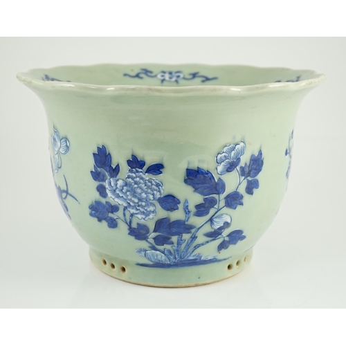 169 - A Chinese blue and white celadon ground flower pot, late 19th century, moulded in white slip and pai... 