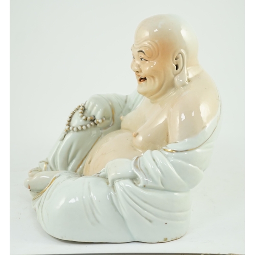 170 - A large Chinese porcelain seated figure of Budai, Republic period, holding a rosary of beads in his ... 