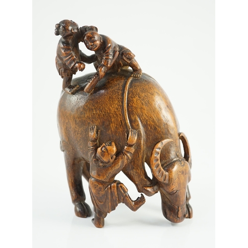 178 - A Chinese bamboo boys and buffalo group, 18th/19th century, finely carved in high relief and openw... 