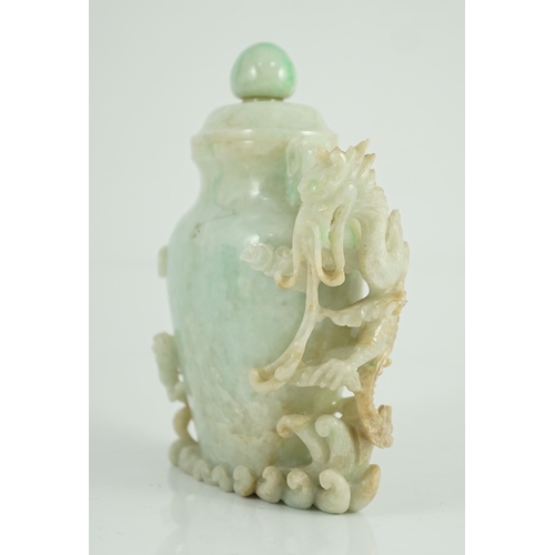 180 - A Chinese jadeite 'dragon' vase and cover, late 19th/early 20th century, carved in high relief and o... 