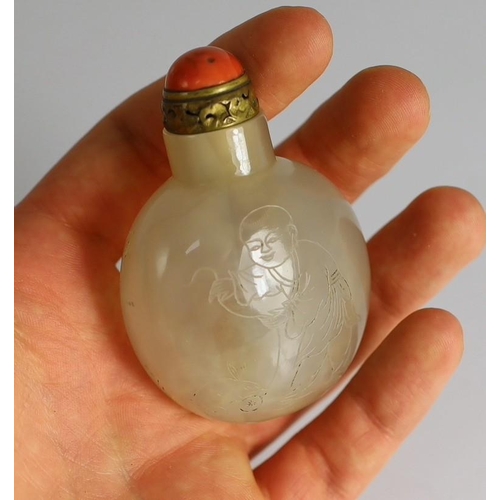 184 - A Chinese agate boys snuff bottle, 19th century of compressed globular form, each side engraved wi... 