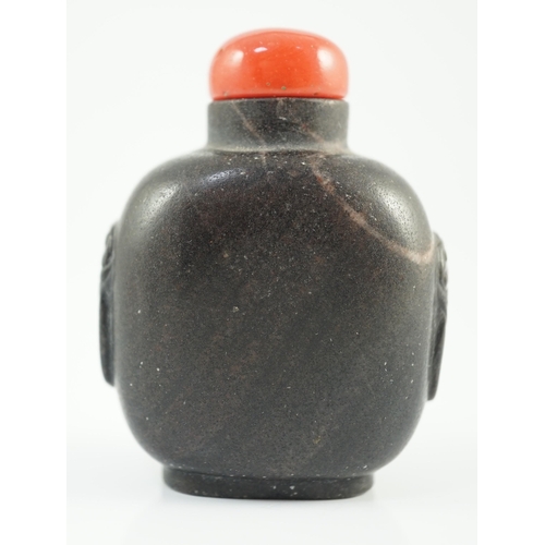 191 - A Chinese two colour marble cameo tiger snuff bottle, 19th century, of flattened oblong form, the ... 