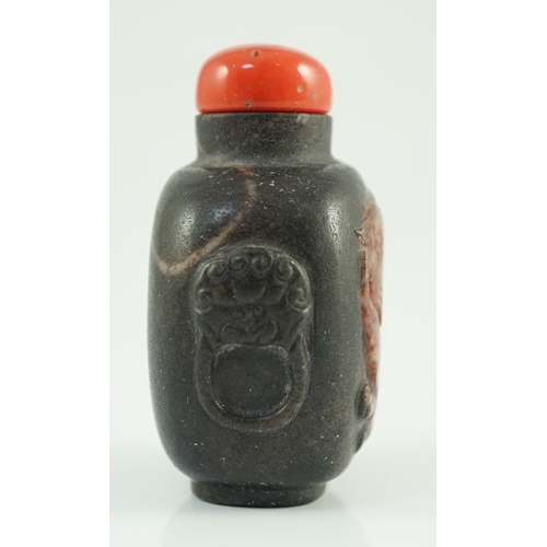 191 - A Chinese two colour marble cameo tiger snuff bottle, 19th century, of flattened oblong form, the ... 