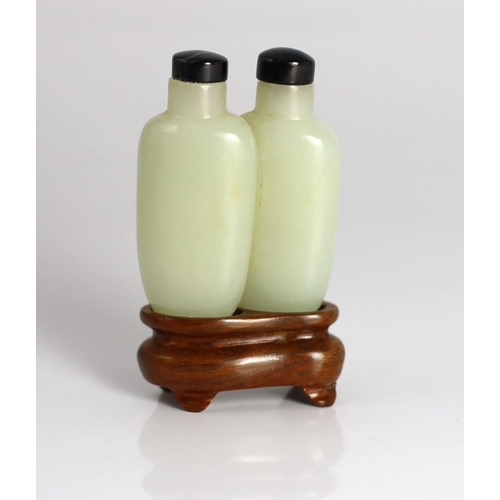 192 - A Chinese pale celadon jade 'double' snuff bottle, 18th/19th century, the stone of good even tone wi... 