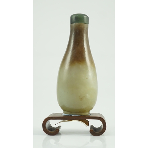 197 - A Chinese celadon and brown jade pear form snuff bottle, 19th century, 7.2cm high