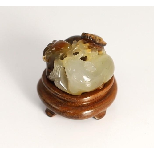 207 - A Chinese two colour agate carving of a ram and a cat, 19th century, the carver skilfully using the ... 