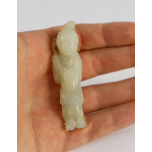 217 - An assembled group of four Chinese pale celadon jade figures, 18th/19th century, the first a group o... 