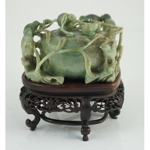 222 - A Chinese jadeite quail and millet water pot and stand, late 19th century, carved in high relief a... 