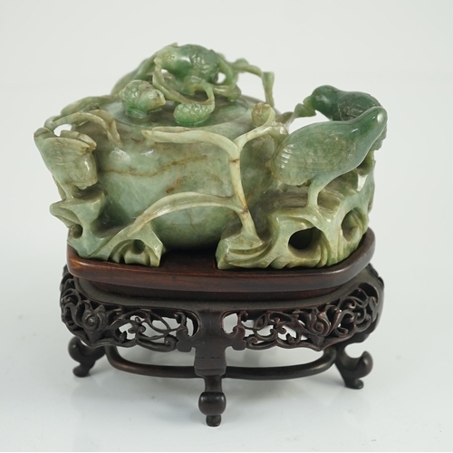 222 - A Chinese jadeite quail and millet water pot and stand, late 19th century, carved in high relief a... 