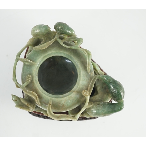 222 - A Chinese jadeite quail and millet water pot and stand, late 19th century, carved in high relief a... 