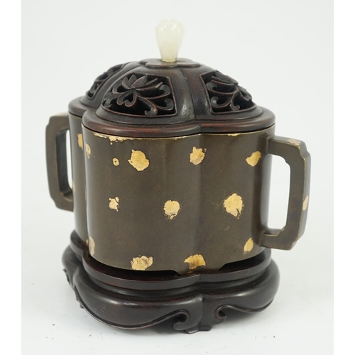 229 - A Chinese gold splashed bronze quatrelobed censer, dark brown patinated with gold splashes, applied ... 