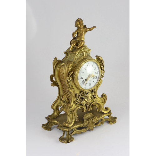 235 - Bernoux of Paris. A 19th century Louis XV style ormolu mantel clock, with putto finial, enamelled Ro... 