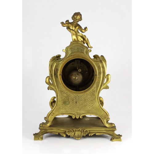 235 - Bernoux of Paris. A 19th century Louis XV style ormolu mantel clock, with putto finial, enamelled Ro... 