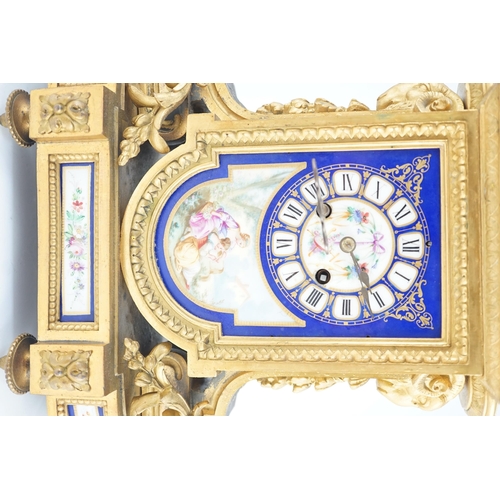 242 - A 19th century French ormolu and Sevres style porcelain mantel clock, with architectural urn surmoun... 