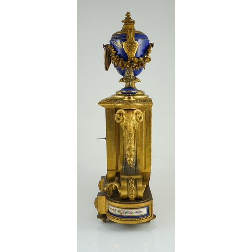 242 - A 19th century French ormolu and Sevres style porcelain mantel clock, with architectural urn surmoun... 