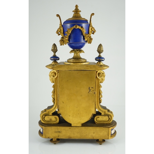 242 - A 19th century French ormolu and Sevres style porcelain mantel clock, with architectural urn surmoun... 