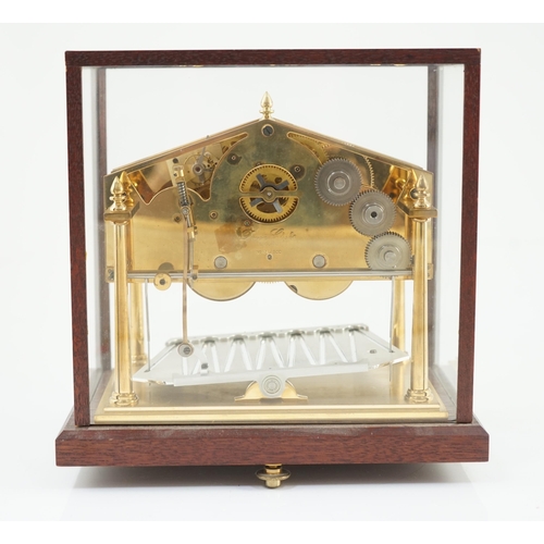 244 - A Devon Clocks lacquered and silvered brass Congreve timepiece, in glazed mahogany case, with centra... 