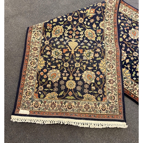 252 - A Bijar blue ground runner, with polychrome floral field, 464cm x 100cm