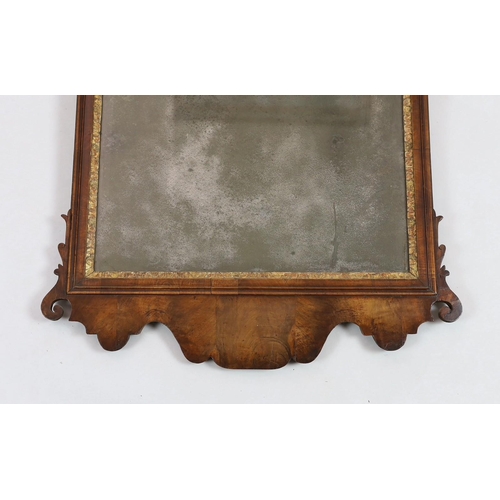 260 - A George II walnut and parcel gilt fret frame wall mirror, with Prince of Wales feathered crest and ... 