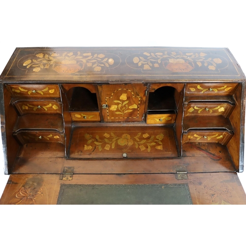 266 - A late 18th century Dutch mahogany and floral marquetry bombé bureau, with fitted interior and well ... 