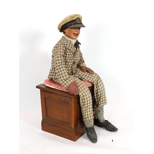 27 - A Leonard Insull ventriloquist's dummy, dressed in a check suit and wearing a sailor's cap, approx. ... 