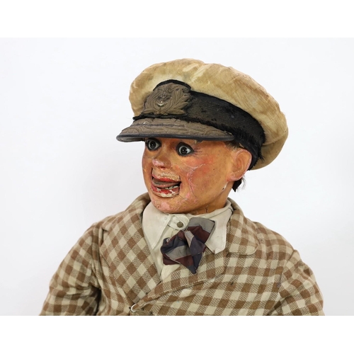 27 - A Leonard Insull ventriloquist's dummy, dressed in a check suit and wearing a sailor's cap, approx. ... 