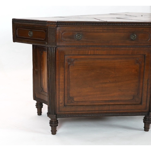 281 - An unusual George IV mahogany kneehole desk, of demi-octagonal form, with segmented leather lined to... 