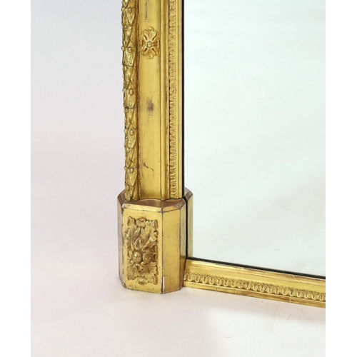 283 - A Victorian giltwood and gesso overmantel mirror, of ornate arched form with foliate scroll and shel... 