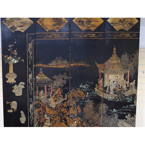 289 - A tall Chinese coromandel lacquer twelve panel screen, 19th century, decorated with fan shaped panel... 