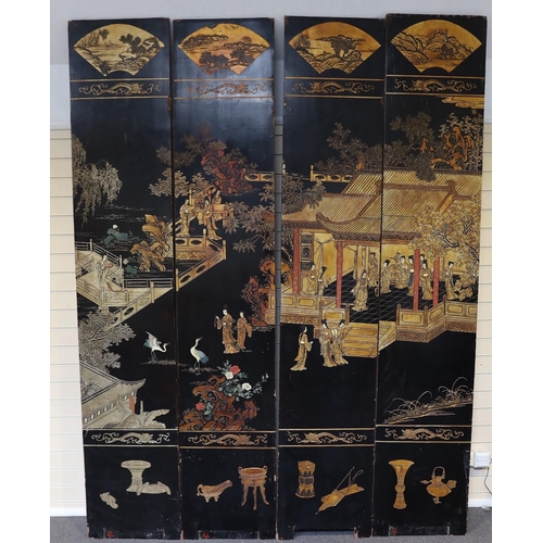 289 - A tall Chinese coromandel lacquer twelve panel screen, 19th century, decorated with fan shaped panel... 