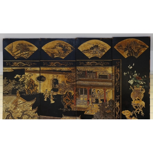 289 - A tall Chinese coromandel lacquer twelve panel screen, 19th century, decorated with fan shaped panel... 