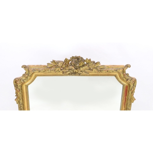 294 - A late 19th century French giltwood and gesso overmantel mirror, with flower, quiver and torch troph... 