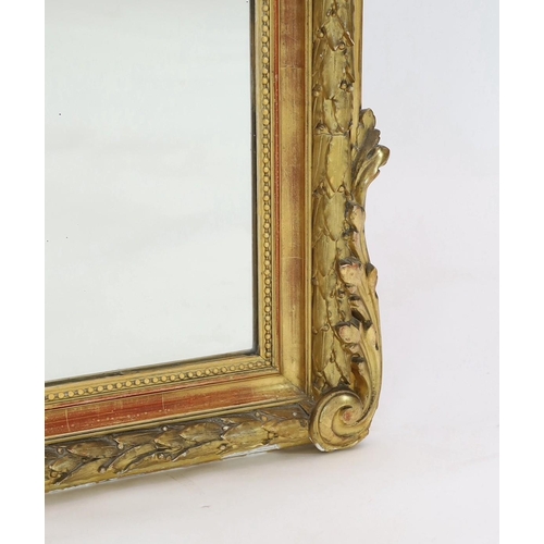 294 - A late 19th century French giltwood and gesso overmantel mirror, with flower, quiver and torch troph... 